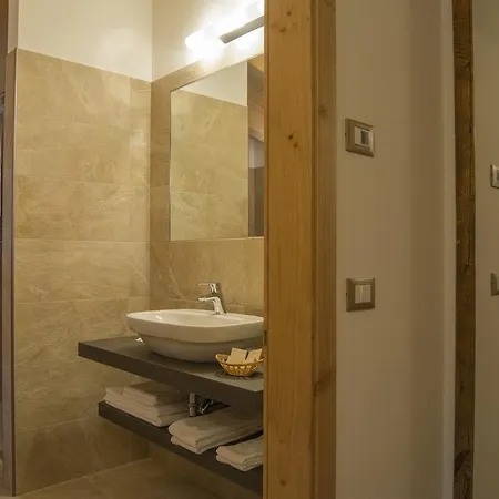 Hotel Garni Caminetto 4*